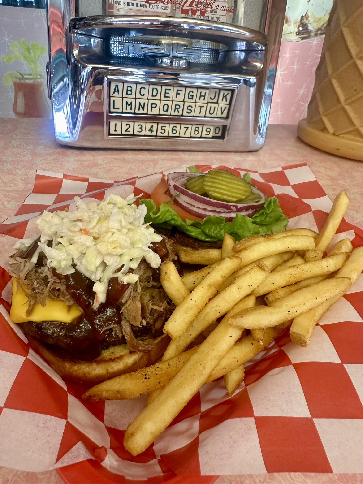 Juicy classic cheeseburger with french fries